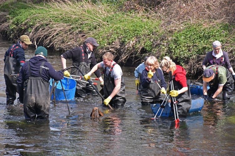 Volunteers at a river cleanup